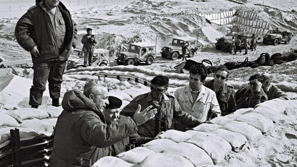 Isreal soldier during 6 days arab war with ben gurion overseeing the battle